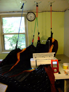 Quilt Hanging system for quilting on a home machine
